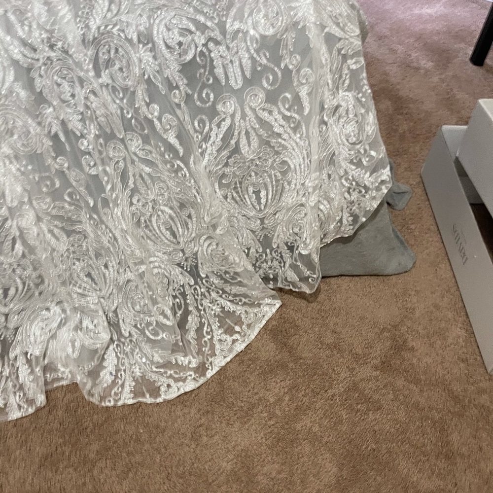 Selling my wedding dress only worn to try on!